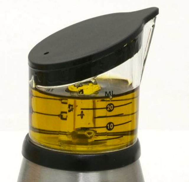 Dispenser per olio con misuratore