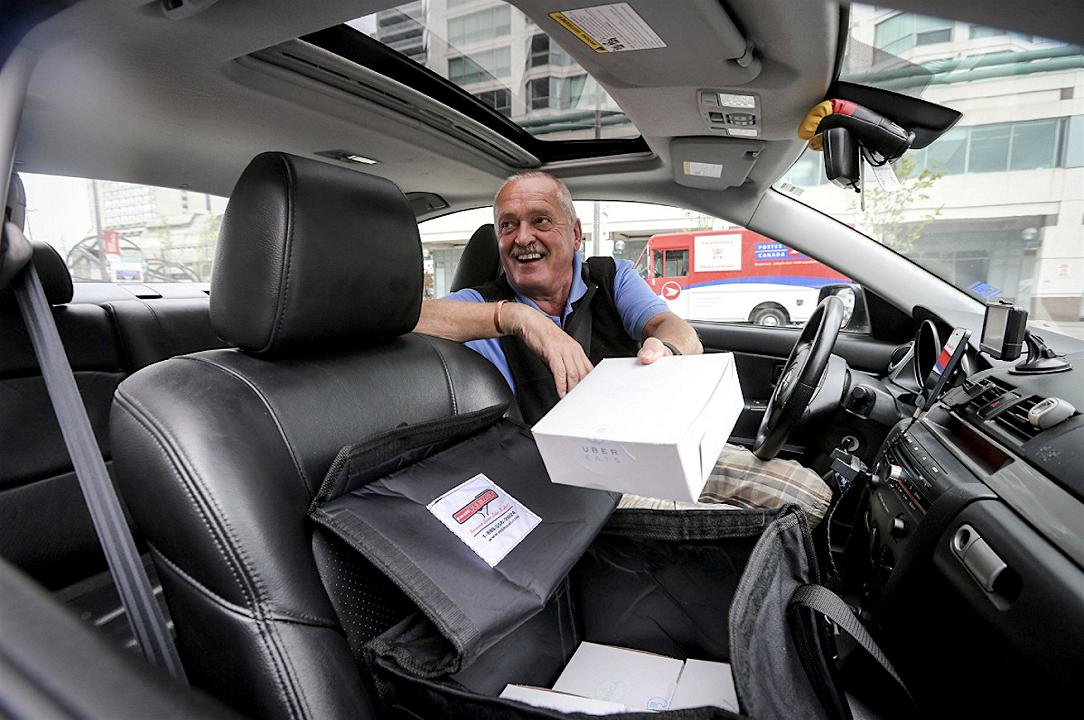 I tassisti minacciano? Uber trasporta pizza e bistecche