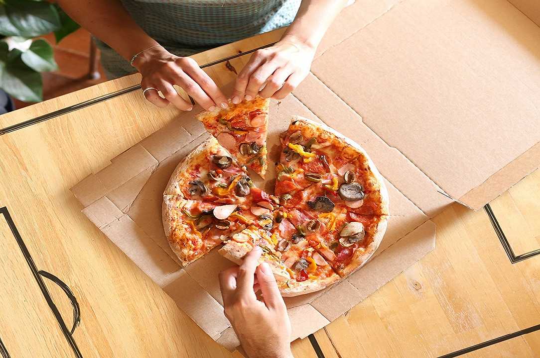 Pizza: un ristorante americano distribuisce tra gli impiegati i profitti del Natale
