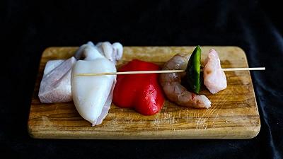 Infilzate il persico e un peperone
