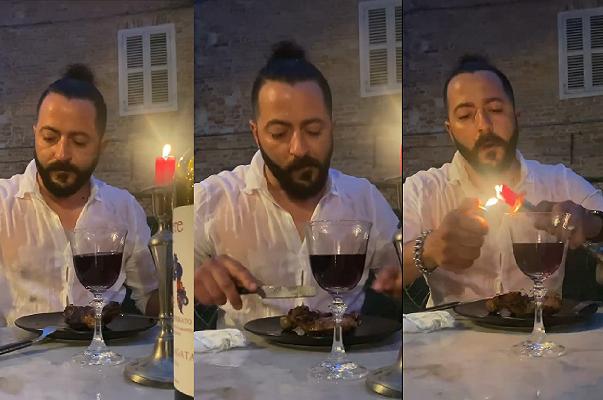 Cena sotto la pioggia: il video ironico di un macellaio di Asti