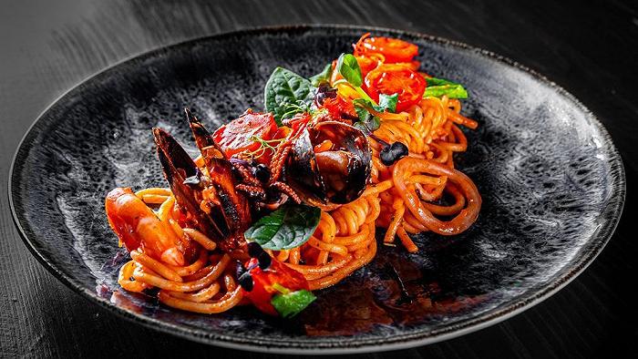 Spaghetti con sugo di pesce