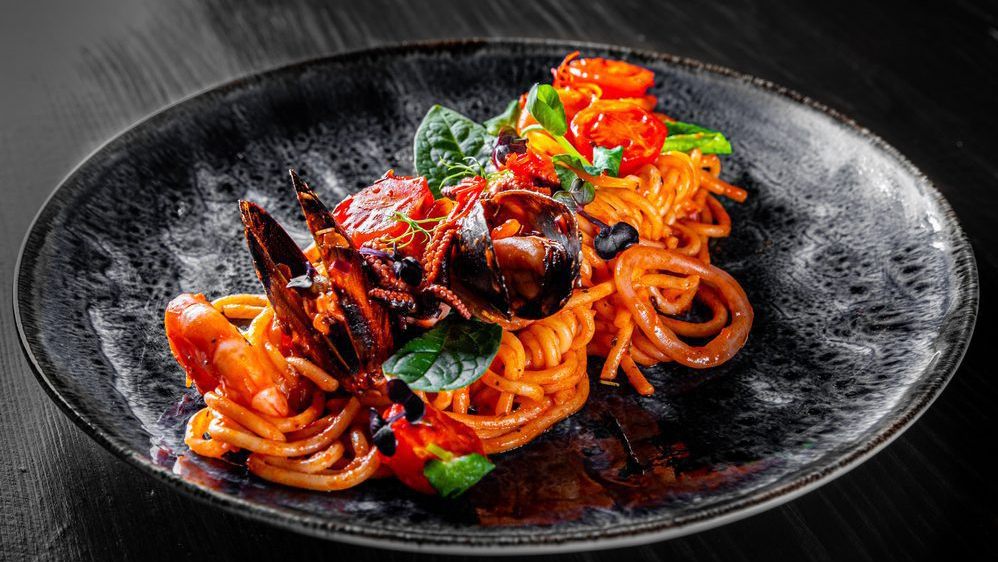 Spaghetti con sugo di pesce