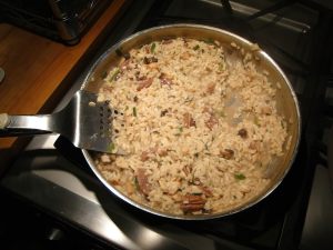 carne aggiunta al risotto
