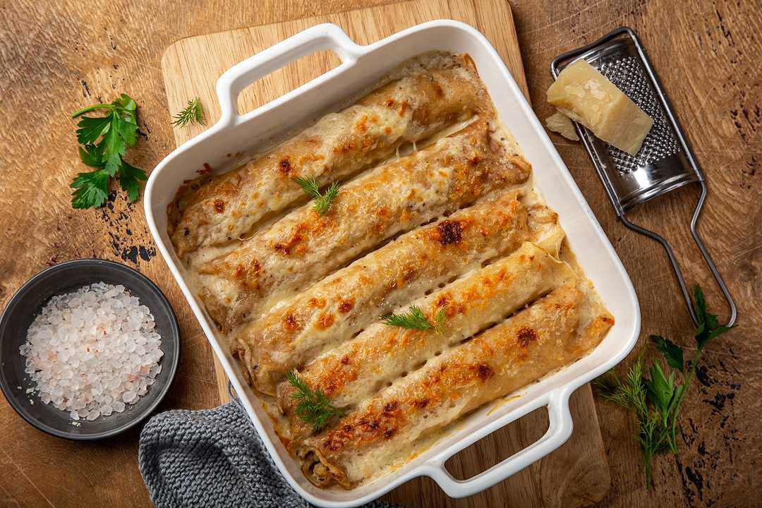 Crespelle ai funghi, la ricetta morbida con la besciamella