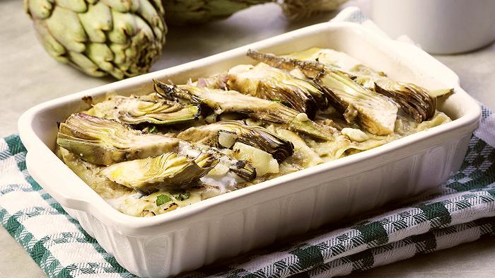 Lasagne ai carciofi, la ricetta di un primo piatto vegetariano e sostanzioso