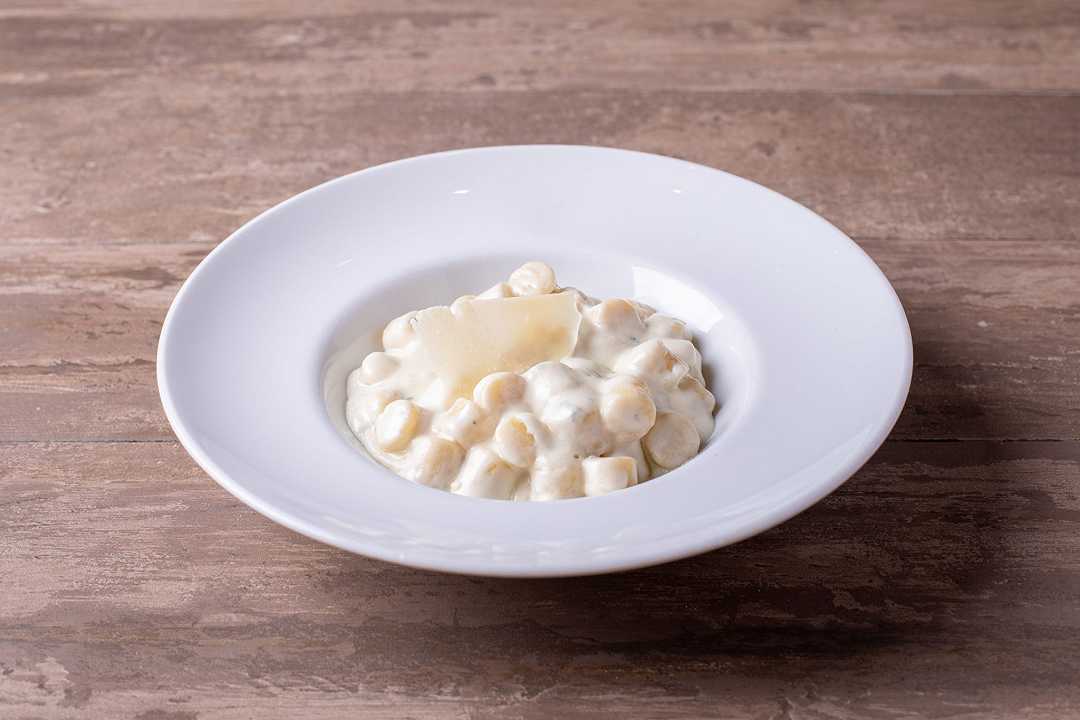 Gnocchi alla bava, la ricetta originale con la fonduta di fontina