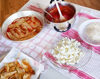 Preparate e cuocete la parmigiana