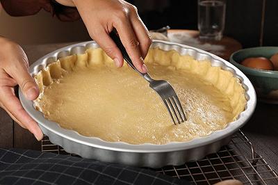 Cuocete la torta salata