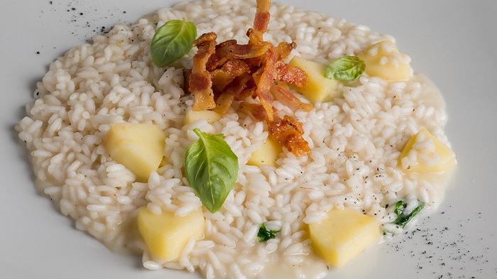 Risotto mele e speck, la ricetta e i consigli per un risultato perfetto
